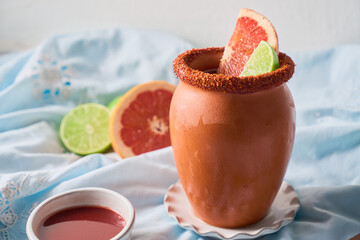 Traditional Mexican Cantarito Cocktail with Fresh Citrus