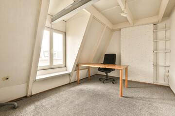 Minimalist attic office space in Amsterdam