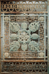 old iron gate all worked on, beautiful art on an iron gate.