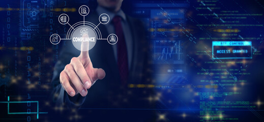 a businessman utilizing compliance icons to enforce laws, regulations, and standards.