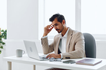 Man happy business computer executive sitting online laptop caucasian businessman worker indoors smiling office