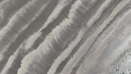 Footsteps sand background