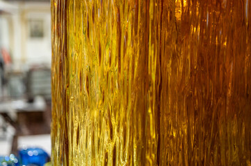 yellow corrugated glass, background, close up view, selective focus