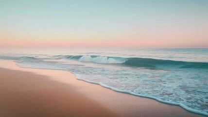 Fototapeta premium Serene beach at dawn with gentle waves and pastel sky.