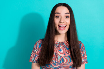 Fototapeta premium Photo of charming excited woman wear print shirt open mouth empty space isolated turquoise color background