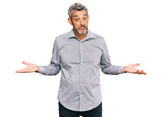 Middle age grey-haired man wearing casual clothes clueless and confused expression with arms and hands raised. doubt concept.