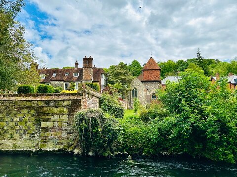 Riverside resident buildings along River Itchen in Winchester, UK