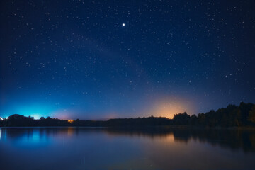 Night Stars Above Lake. Natural Starry Sky Background Backdrop Landscape