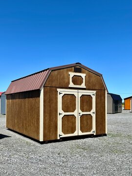 American style wooded shed. A shed is typically simple, single-story roofed structure in a back garden or on an allotment that is used for storage, hobbies, or as a workshop.
