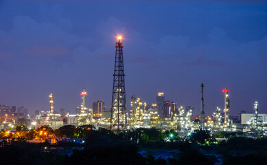 A crane on a large cargo ship docks loading a diesel-electric locomotive. Get off at Laem Chabang Port