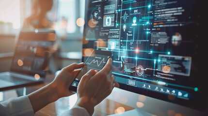 A businesswoman working with digital marketing media on a virtual screen, using a mobile phone and modern computer with a VR icon diagram in the office during morning light.
