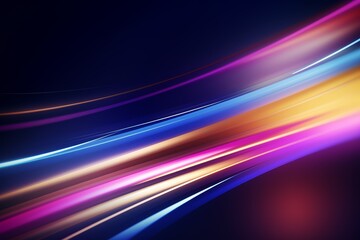 Colorful abstract light streaks in motion against a dark background, creating a dynamic and vibrant visual effect.