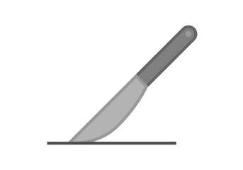 Cuchillo gris de cocina cortando