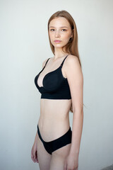 Fototapeta premium Perfect slim young model woman in lingerie studio snapshot