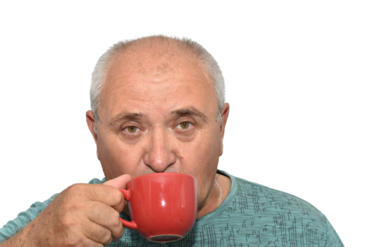 Portrait of an elderly man drinking from a brown cup.