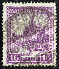 Cancelled postage stamp printed by Hungary, that shows Matthias Church and Fisher's Bastion, circa 1926.
