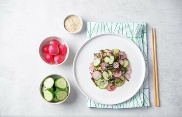 Seaweed radish cucumber salad in a plate