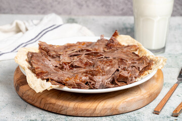 Meat Doner. Traditional Turkish cuisine taste. Cooked meat doner kebab on gray background. local...