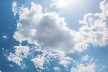 blue sky with clouds and sunlight