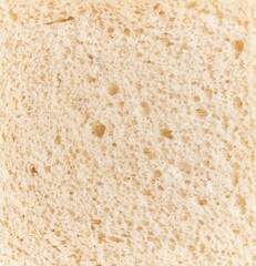 Close-up view of textured wholegrain bread for food-related stock imagery.