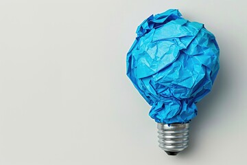 Blue Crumpled Paper Light Bulb Concept