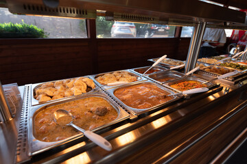 buffet table with a large number of dishes