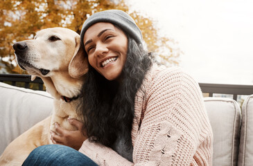 Happiness, woman and dog on bench for hug, adoption and loyalty in garden. Mental health, female...