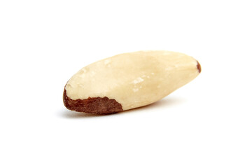Close-up view of a single Brazil nut with brown skin patches, isolated on a white background. Ideal for showcasing healthy eating, nutrition, and ingredients