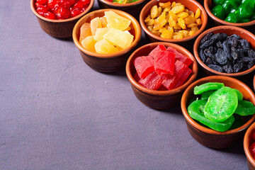 Group of dried and candied fruit in bowl