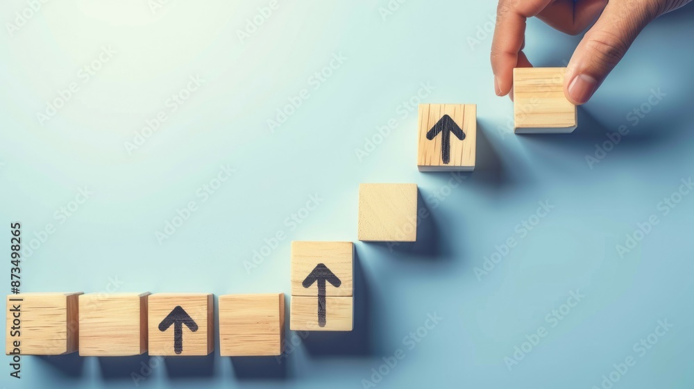 Poster wooden blocks path to success. visualize progress with this image of wooden blocks forming a stairca