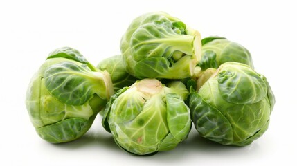Fototapeta premium Fresh brussels sprouts. Close-up image of fresh Brussels sprouts isolated on a white background.