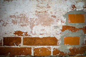 background brick wall partially plastered. copy space and mockup