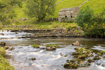 Obraz premium Europe, United Kingdom, England, Yorkshire, Yorkshire Dales. Buckden, Skipton, Nature walks through Yorkshire Dales. The River Wharfe.