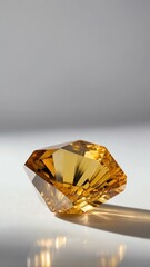 a single citrine crystal is featured on a pure white b background