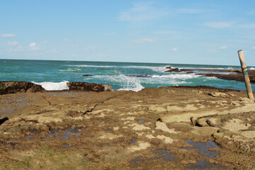 The Rocky Coastline at low tide at Cunhau Beach near Pipa Beach in the State of Rio Grande do Norte, Brazil