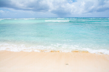 Blue tropic ocean, White beach and waves, east coast of Kayangel island, Palau