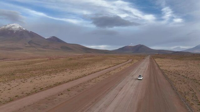 Atacama Desert, Chile. Car on the road. Aerial view by drone.