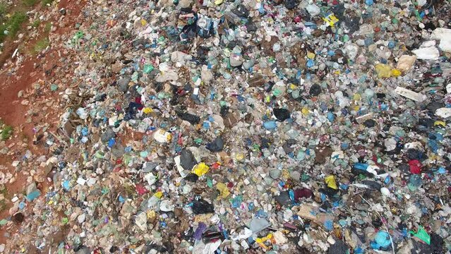 Aerial view of an open dump, a method of disposing of solid waste that causes great environmental impact, pollutes the soil and contaminates water - Campo Belo, Minas Gerais, Brazil