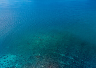 Fototapeta premium Aerial view of blue sea surface
