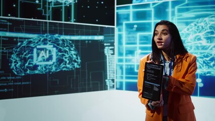 Public speaker doing presentation at tech forum event, explore ways emerging AI technologies can positively enhance companies workforce. Indian woman promoting artificial intelligence solutions