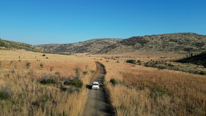 African Road At Pilanesberg National Park In North West South Africa. African Animals Landscape. Pilanesberg National Park. Pilanesberg National Park At North West South Africa. Big Five Animals.