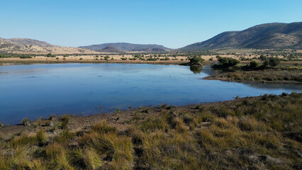 Obraz premium African Lake At Rustenburg In North West South Africa. African Animals Landscape. Pilanesberg National Park. Rustenburg At North West South Africa. Big Five Animals. Wildlife Safari.