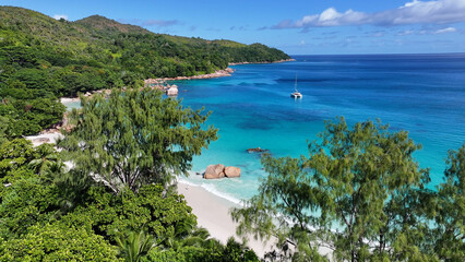 Obraz premium Anse Lazio At Praslin Island In Victoria Seychelles. Indian Ocean Beach. Africa Background. Praslin Island At Victoria. Tourism Landscape. Nature Seascape. Outdoors Travel.