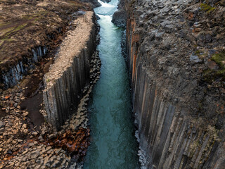 Epic aerial view of the studlagil basalt canyon, Iceland. One of the most wonderfull nature...