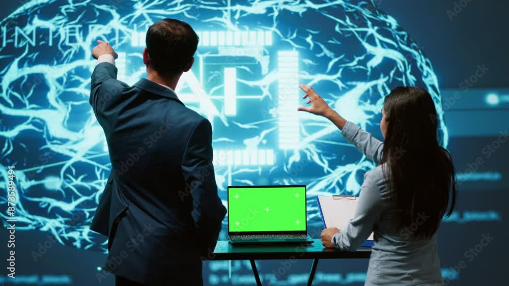 Poster ai developers using isolated screen device for business data analysis. it department staff members w