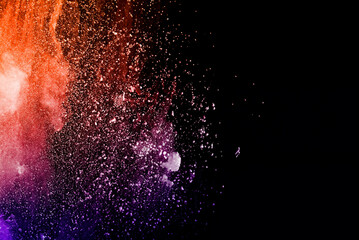 Cosmic Color Burst, Orange and Purple Powder Explosion on Black Background