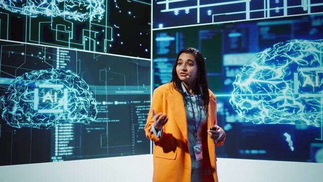 Speaker talking with audience on stage at AI conference bringing together leading experts and researchers to explore latest developments in artificial intelligence and machine learning, camera B
