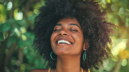 Afro-American Woman Smiling in Nature, Joyful Expression, Green Background