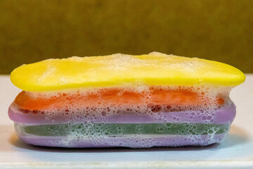 Ball of Used Soaps of different colors. economy and use