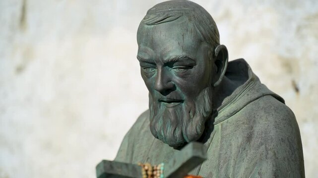 A close up of the statue of Padre Pio, in the town of Atrani in Italy.